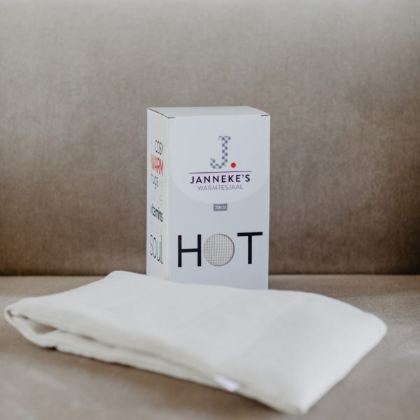 Handgemaakte warmtesjaal met binnenzak gevuld met lijnzaad.